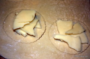 cutting out provolone turnovers