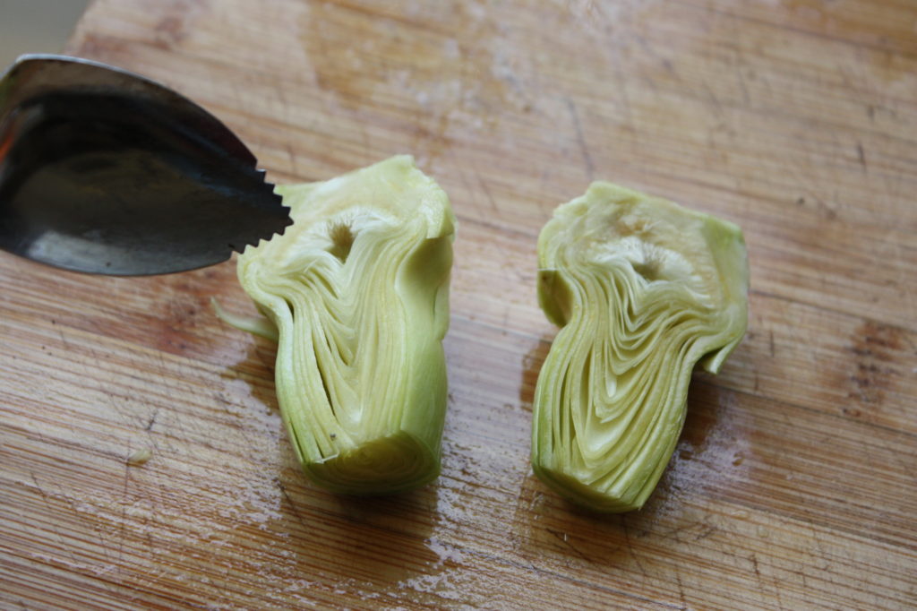 grapefruit spoon and raw artichoke